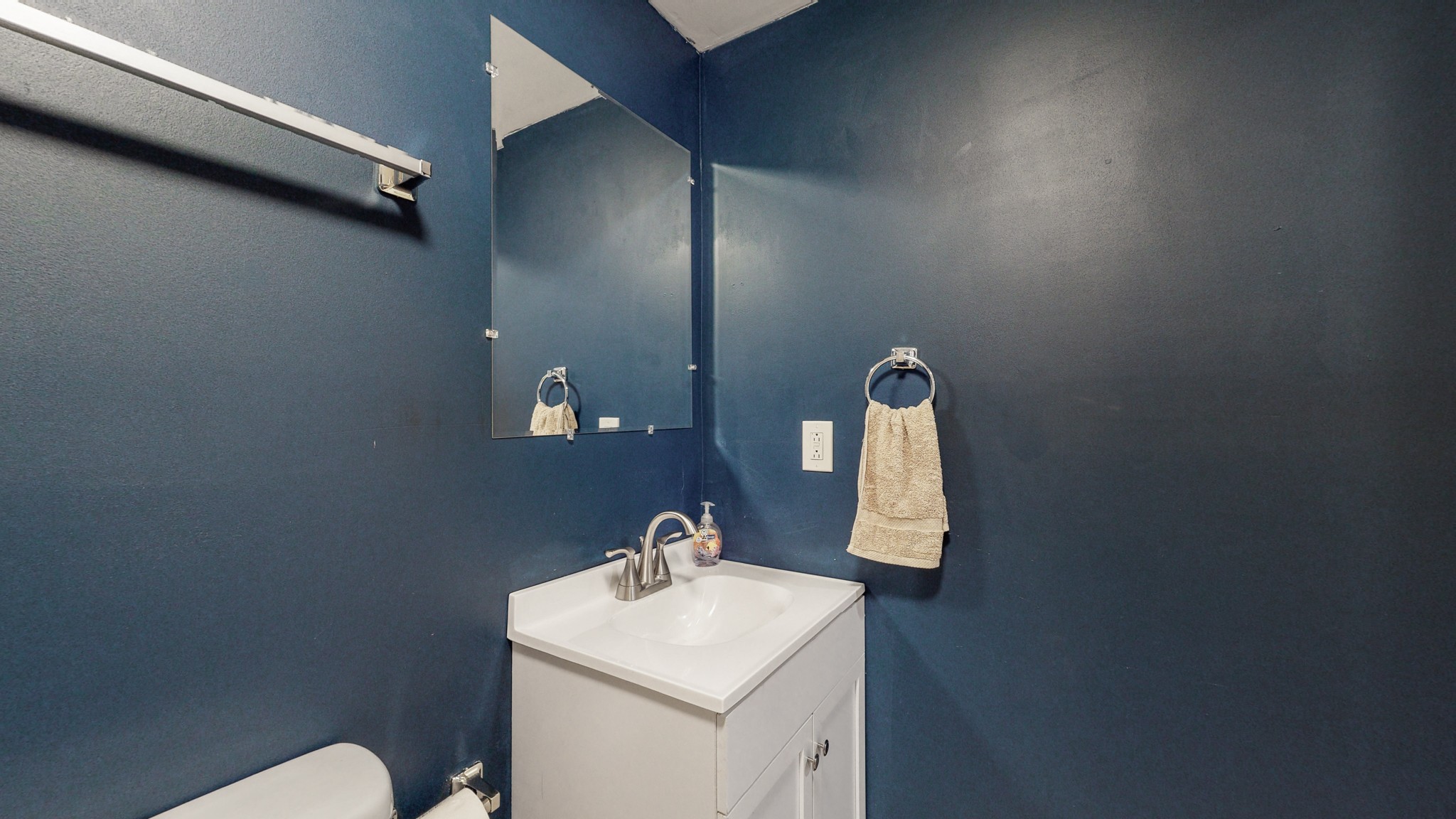 819 Neelys Bend Road Madison, TN 37115 - Photo 24 of 48 a bathroom with a toilet sink and mirror