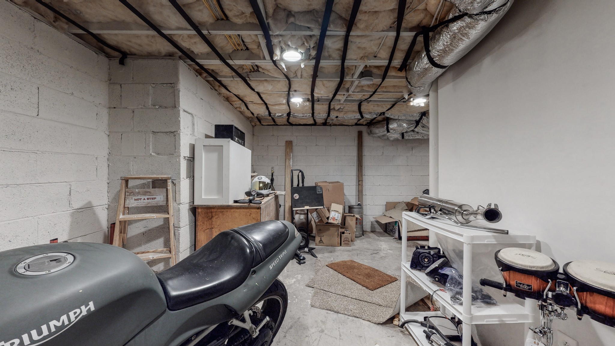 819 Neelys Bend Road Madison, TN 37115 - Photo 29 of 48 a room with furniture and gym equipment