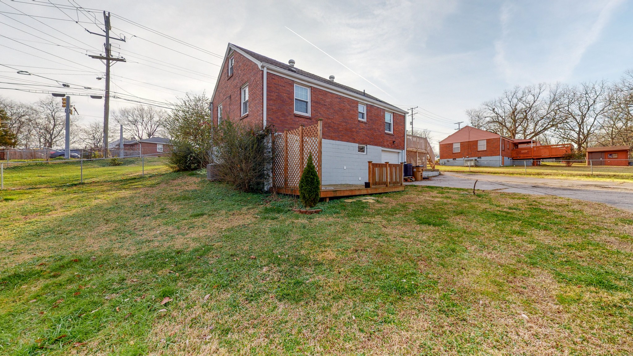 819 Neelys Bend Road Madison, TN 37115 - Photo 46 of 48 a view of a big building with big yard and large trees