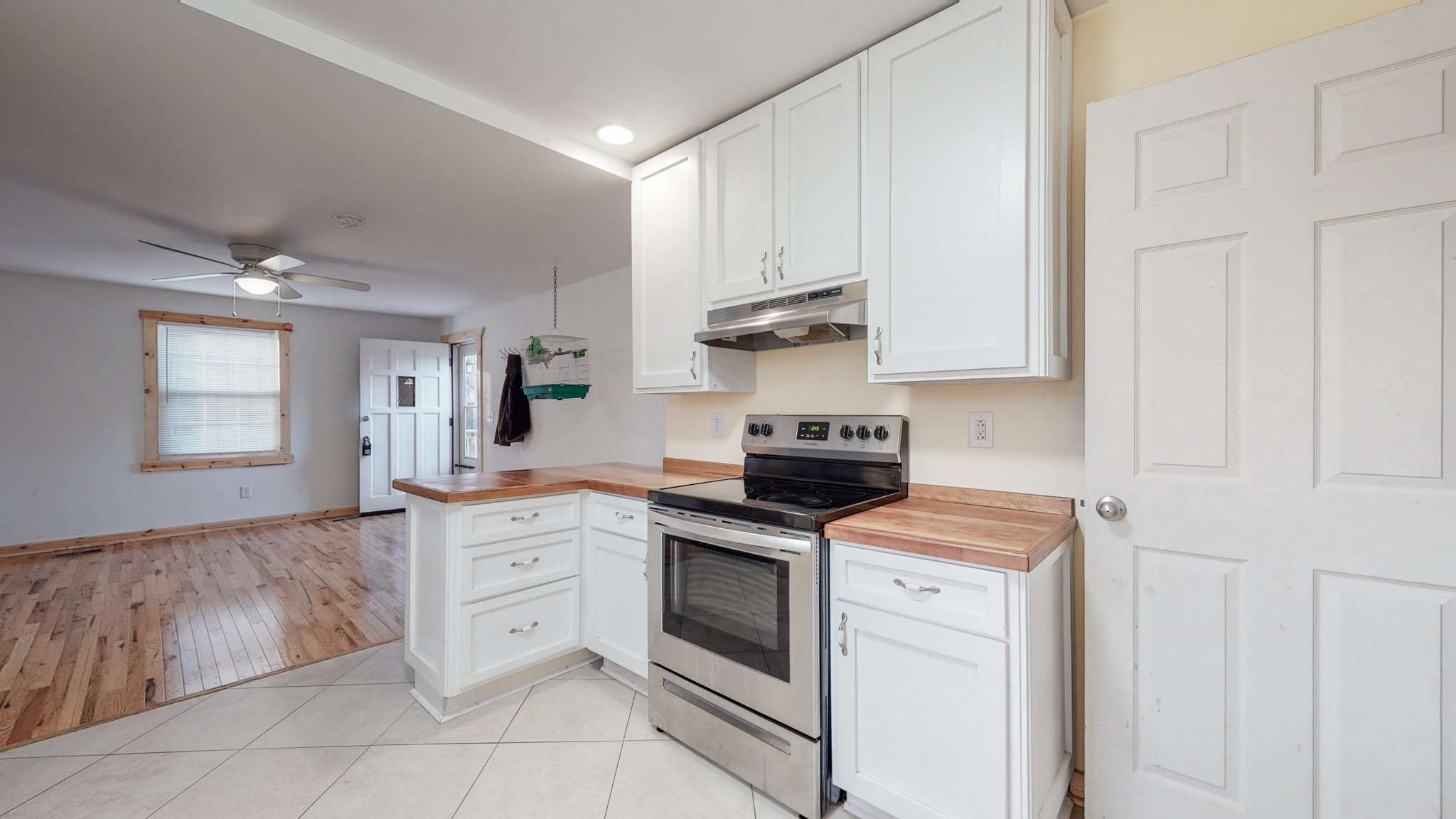 819 Neelys Bend Road Madison, TN 37115 - Photo 9 of 48 a kitchen with white cabinets and appliances