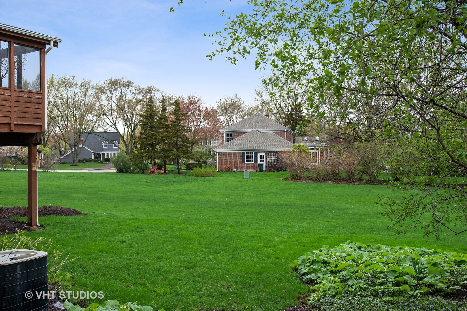 415 North Valley Road Barrington, IL 60010 - Photo 29 of 36 a front view of a house with garden and a tree
