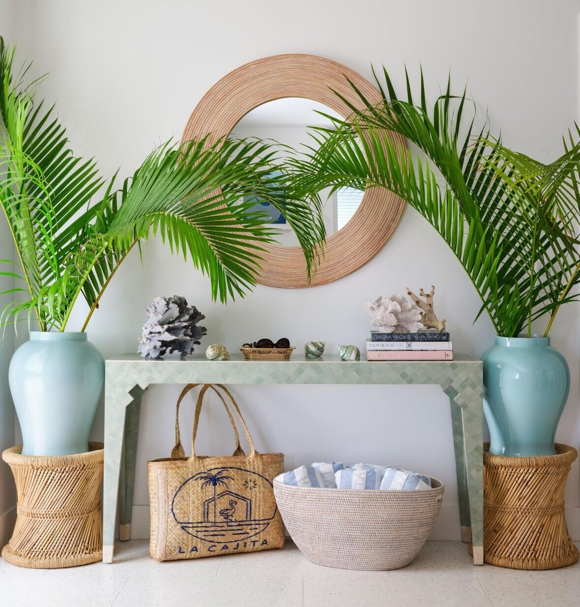 255 Cortez Road West Palm Beach, FL 33405 - Photo 4 of 24 a view of a dining room with a floor to ceiling window and potted plants