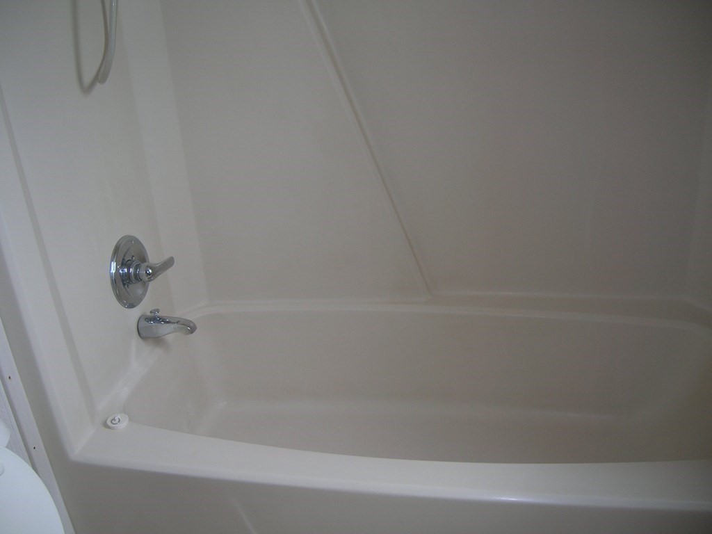 8 Willow Terrace Taunton, MA 02780 - Photo 9 of 14 a close up of a bathtub