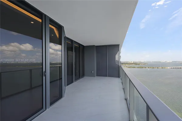 a kitchen with stainless steel appliances a sink and a stove