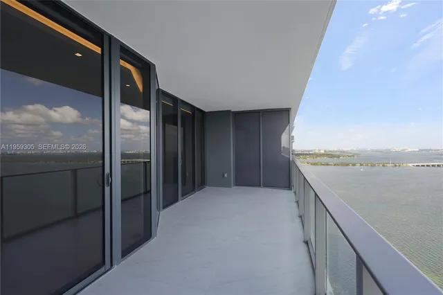 a kitchen with stainless steel appliances a sink and a stove