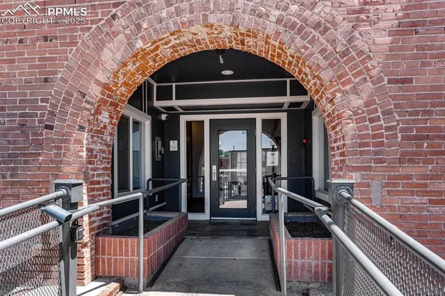 a front view of a house with glass windows
