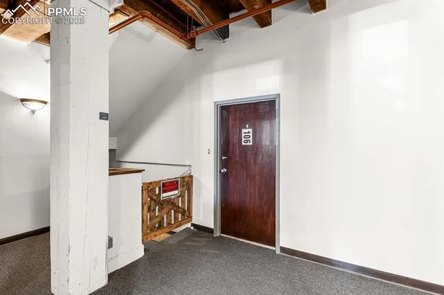 a view of hallway with washer and dryer