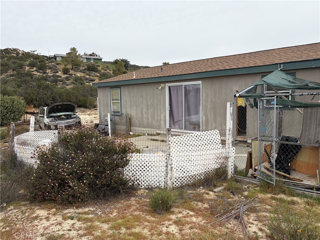 61200 Indian Paint Brush Road Anza, CA 92539 - Photo 16 of 73 a front view of a house with a outdoor space