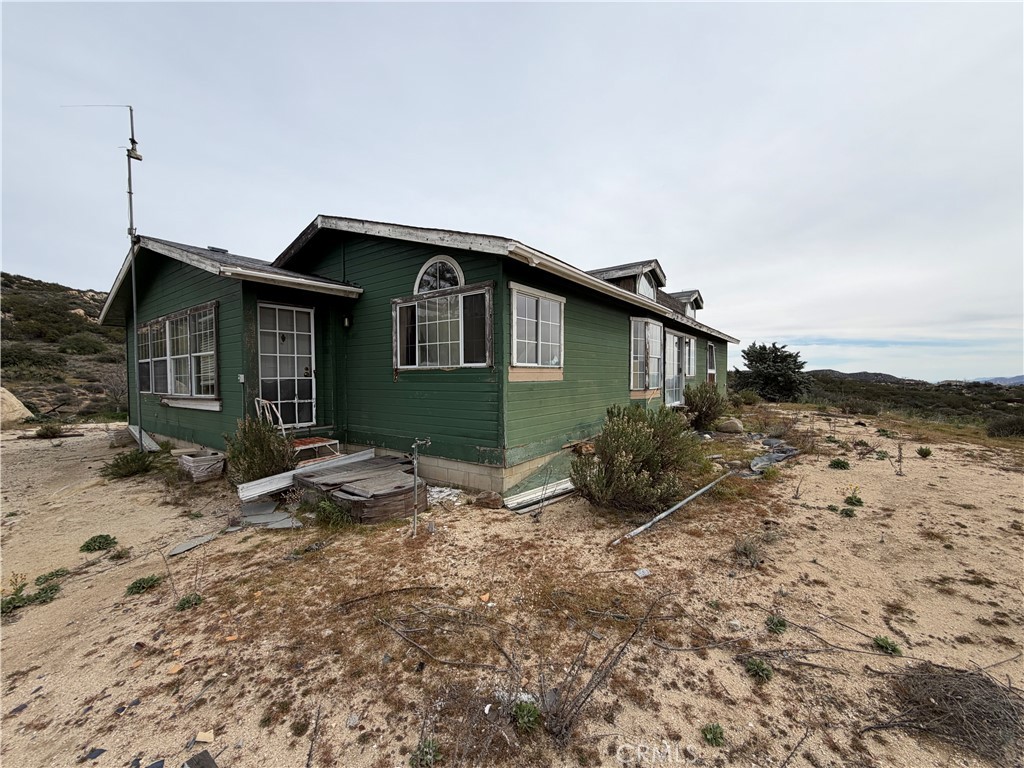 61200 Indian Paint Brush Road Anza, CA 92539 - Photo 26 of 73 a view of a house with backyard and trees