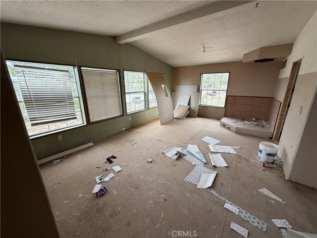 61200 Indian Paint Brush Road Anza, CA 92539 - Photo 30 of 73 a view of a livingroom with furniture and windows