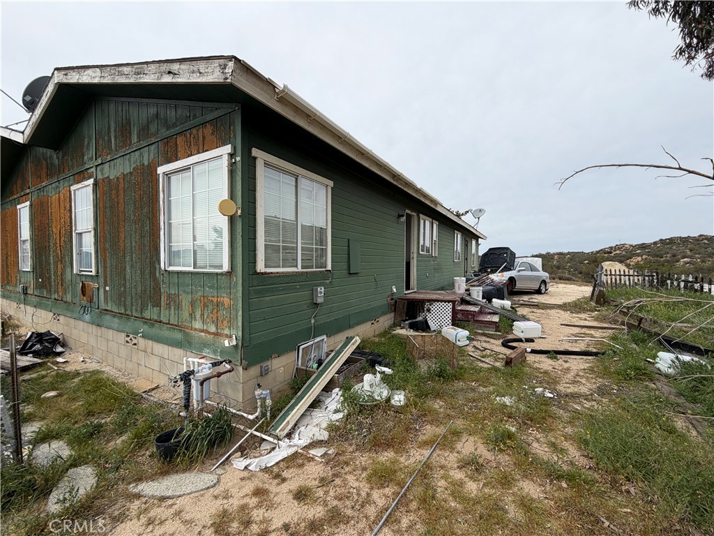 61200 Indian Paint Brush Road Anza, CA 92539 - Photo 36 of 73 a view of backyard with wheel chair and potted plants