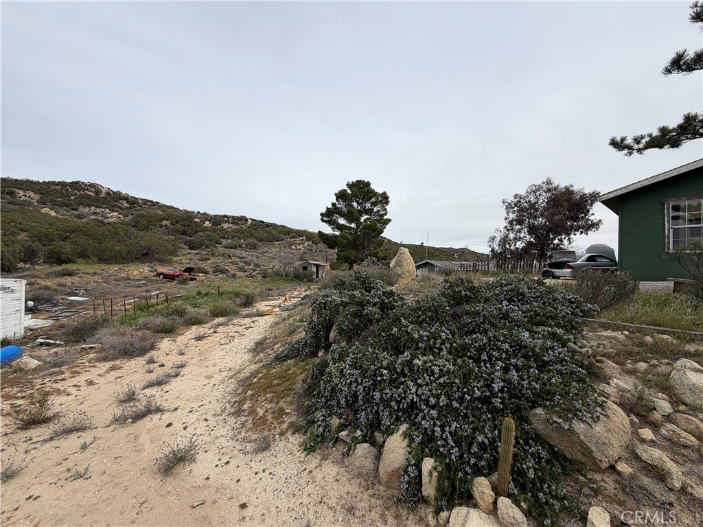 61200 Indian Paint Brush Road Anza, CA 92539 - Photo 62 of 73 a view of a dry yard with mountains in the background