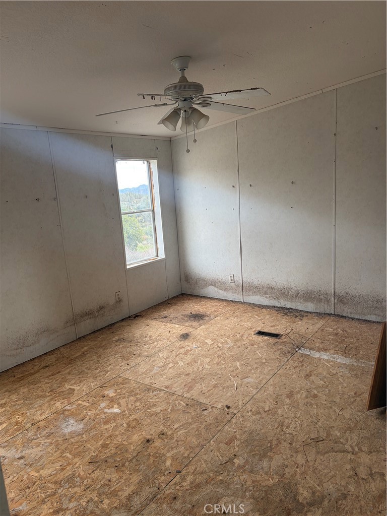61200 Indian Paint Brush Road Anza, CA 92539 - Photo 7 of 73 an empty room with a empty space and windows