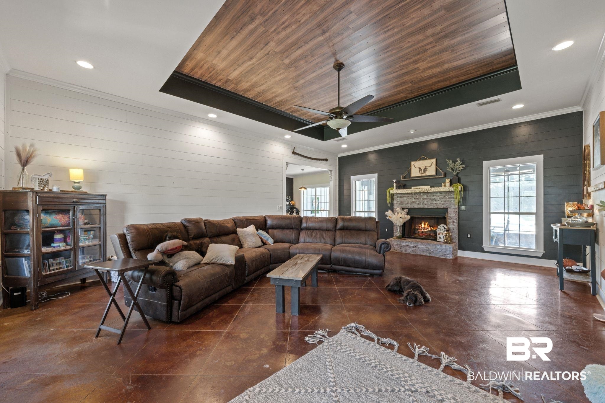 15635 North A N Brady Road Bay Minette, AL 36507 - Photo 7 of 51 Living room with wood ceiling, a fireplace, a tray ceiling, and ceiling fan
