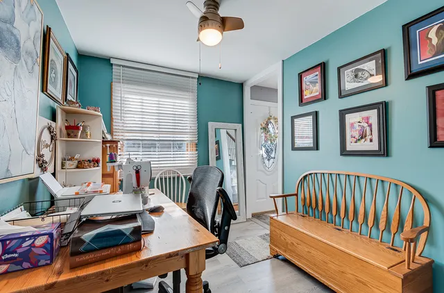 a bedroom with furniture and a window