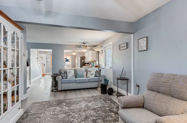 a living room with furniture and a couch