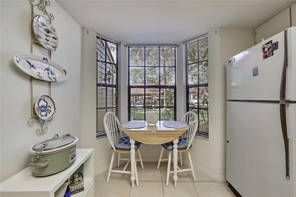 2111 Forester Way Spring Hill, FL 34606 - Photo 12 of 33 a dining room with furniture and window