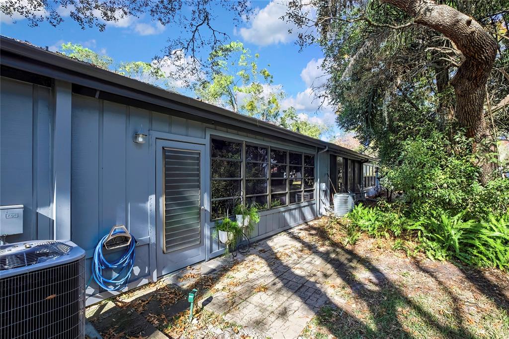2111 Forester Way Spring Hill, FL 34606 - Photo 27 of 33 a front view of a house with garden