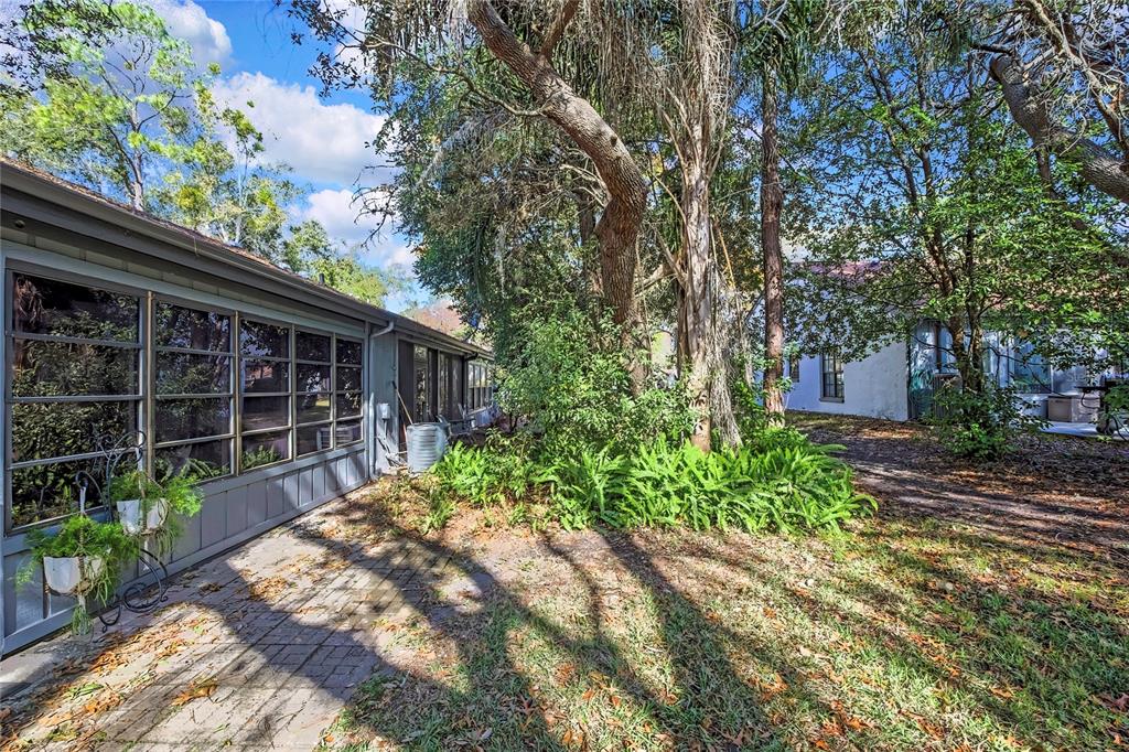 2111 Forester Way Spring Hill, FL 34606 - Photo 28 of 33 a front view of a house with a yard