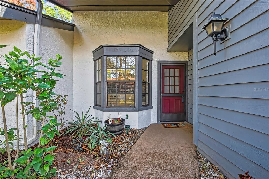 2111 Forester Way Spring Hill, FL 34606 - Photo 30 of 33 a front view of a house with a yard