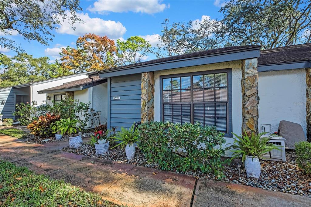 2111 Forester Way Spring Hill, FL 34606 - Photo 32 of 33 a front view of a house with a yard