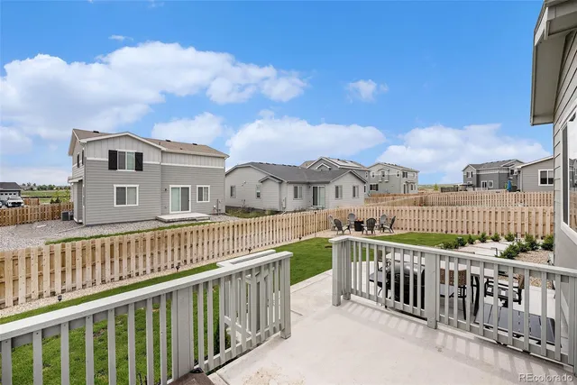 a view of a street from a balcony