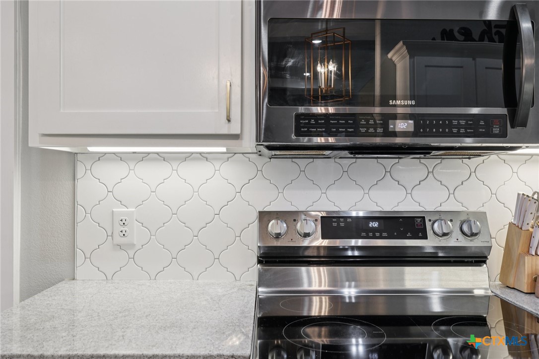 1522 Curlew Lane Temple, TX 76502 - Photo 9 of 35 a bathroom with a sink and a mirror