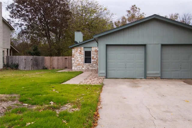 a front view of house with yard