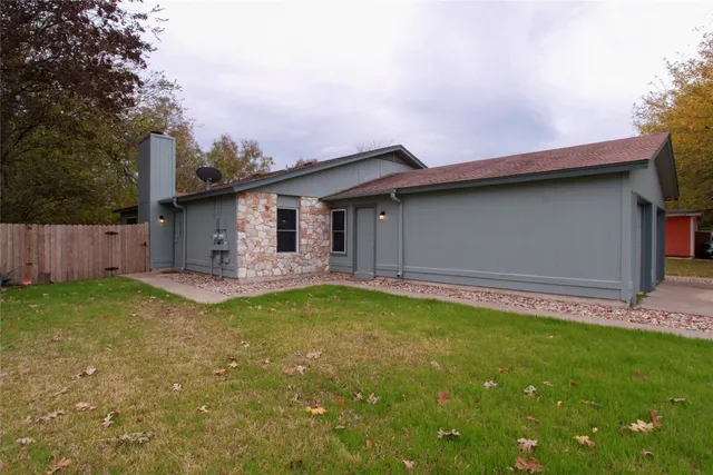 a backyard of a house with lots of green space