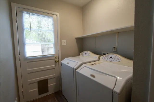 a utility room with dryer and washer