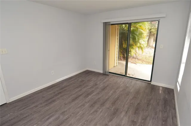 a view of a wooden door of the house