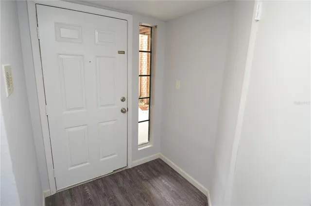 a kitchen with a refrigerator sink and stove