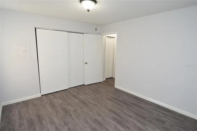 a view of a storage and utility room with washer and dryer