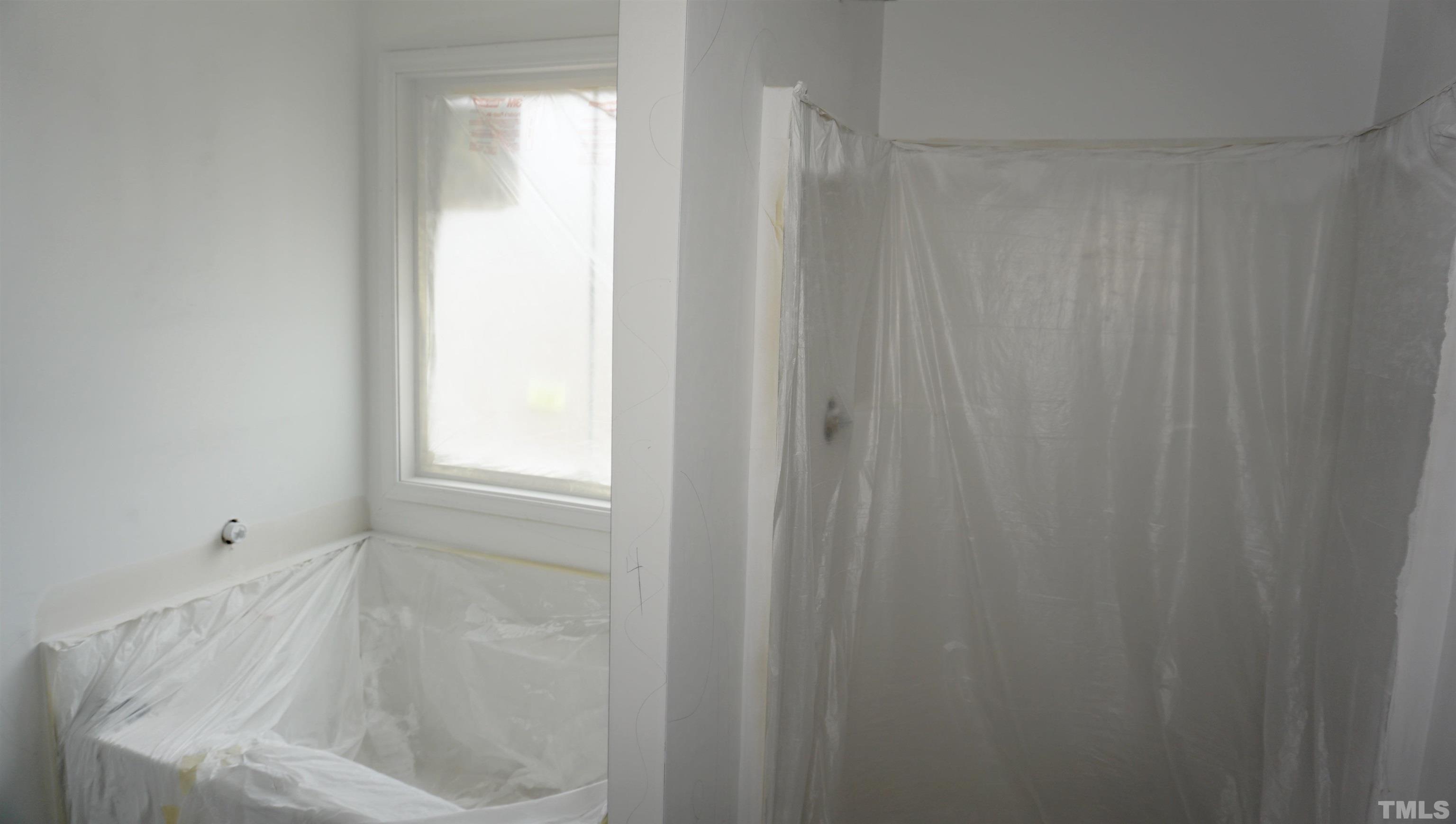 10541 West Old Spring Hope Road Spring Hope, NC 27882 - Photo 11 of 20 a bathroom with a bathtub
