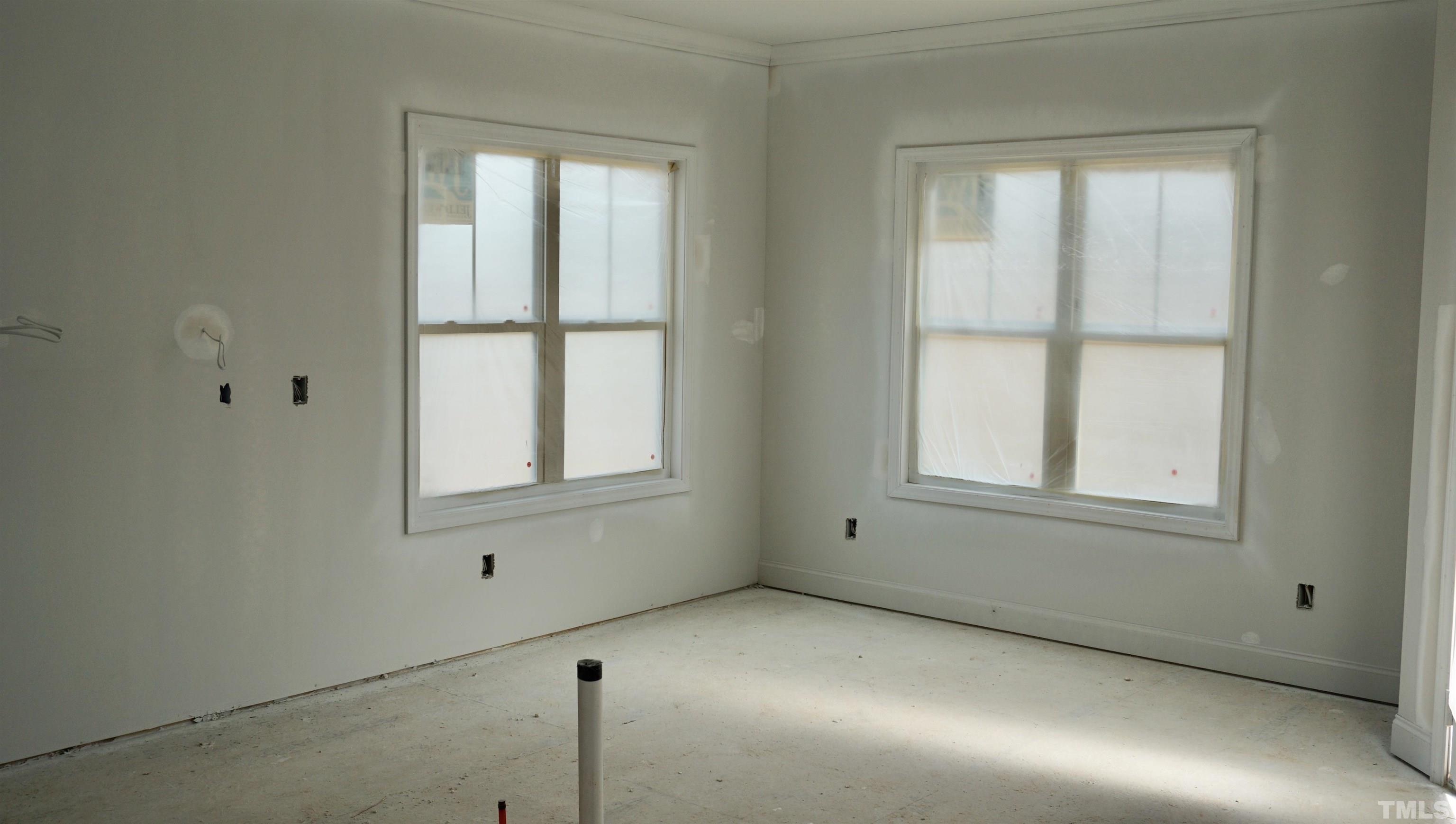 10541 West Old Spring Hope Road Spring Hope, NC 27882 - Photo 6 of 20 an empty room with a window