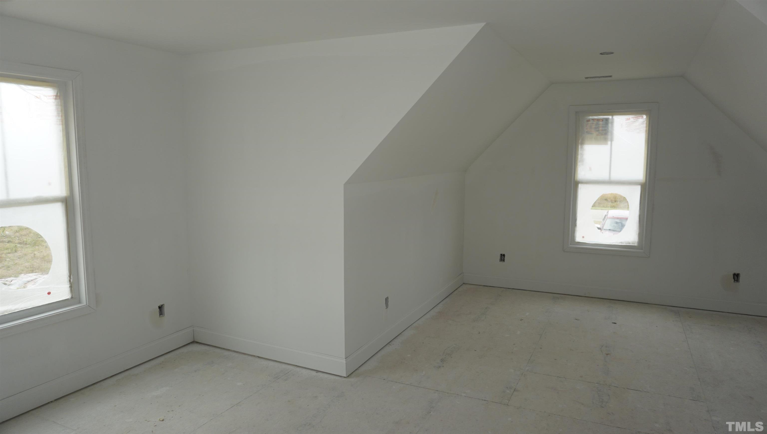 10541 West Old Spring Hope Road Spring Hope, NC 27882 - Photo 10 of 20 an empty room with windows