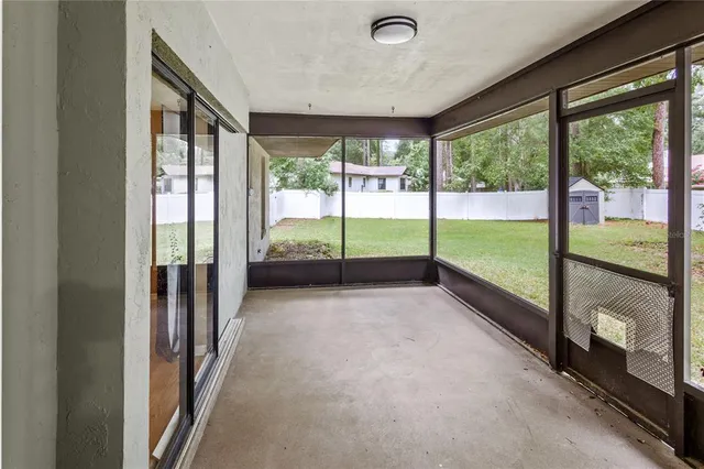 a view of an empty room and window