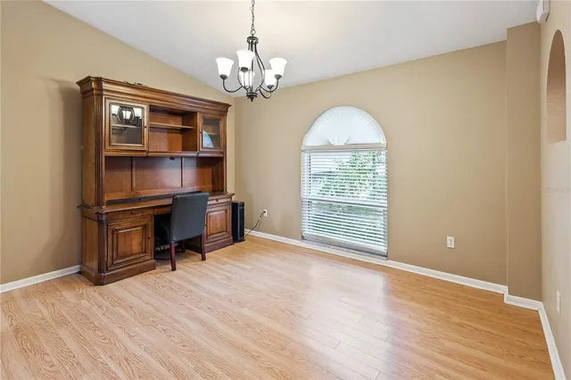 a view of a livingroom with a workspace