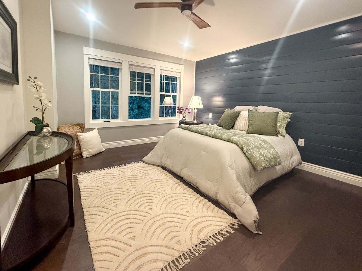 56 Nanea Street Hilo, HI 96720 - Photo 13 of 29 a bedroom with a bed and a chair