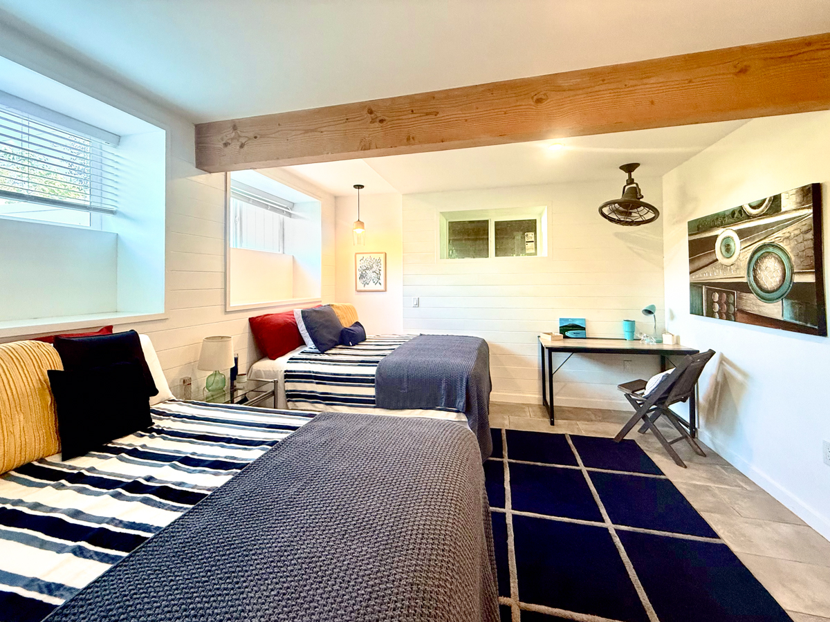 56 Nanea Street Hilo, HI 96720 - Photo 20 of 29 a bedroom with furniture and wooden floor