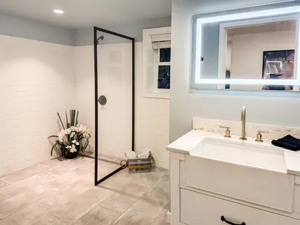 a bathroom with a sink and a mirror