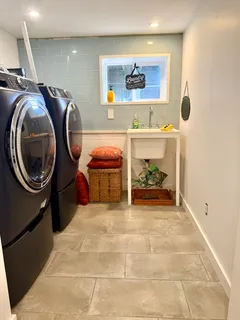 a view of a storage & utility room dryer and washer