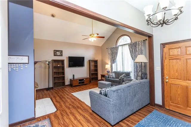 a kitchen with stainless steel appliances granite countertop a stove a sink dishwasher and a refrigerator