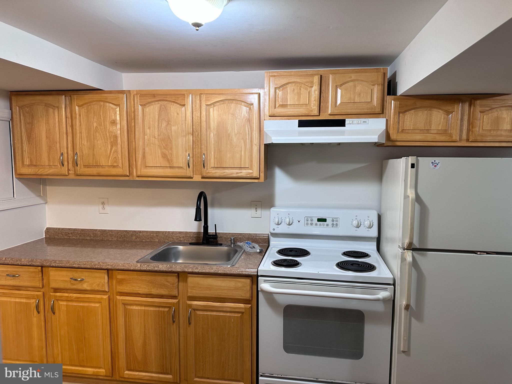12802 Atherton Drive Silver Spring, MD 20906 - Photo 7 of 16 Kitchenette in basement
