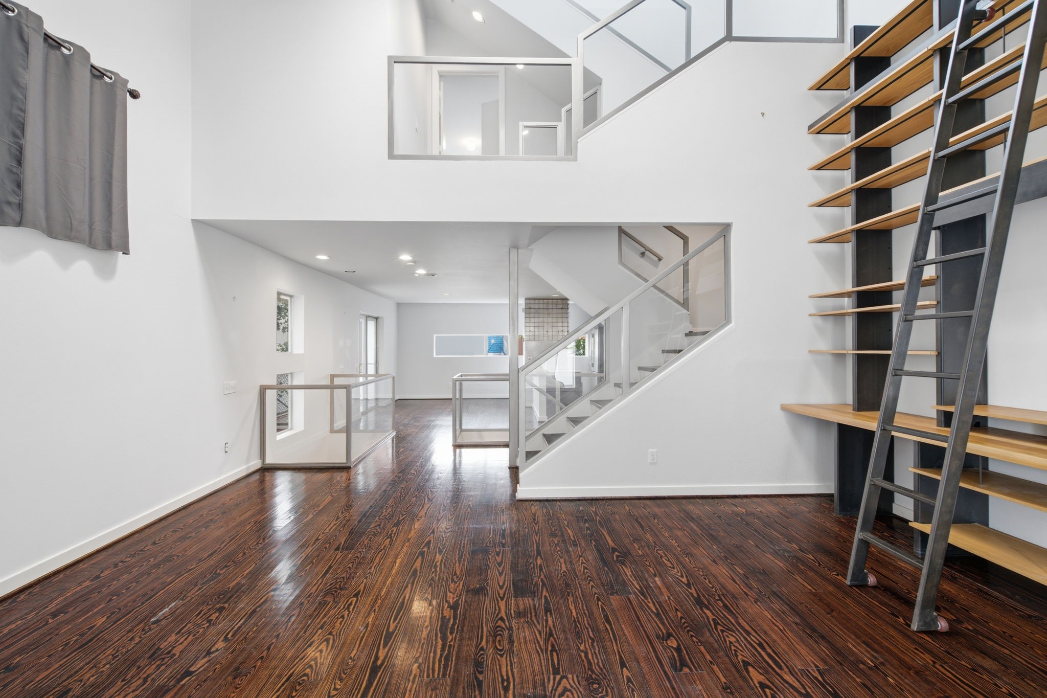 2934 Commerce Street Houston, TX 77003 - Photo 37 of 44 a view of entryway and hall with wooden floor