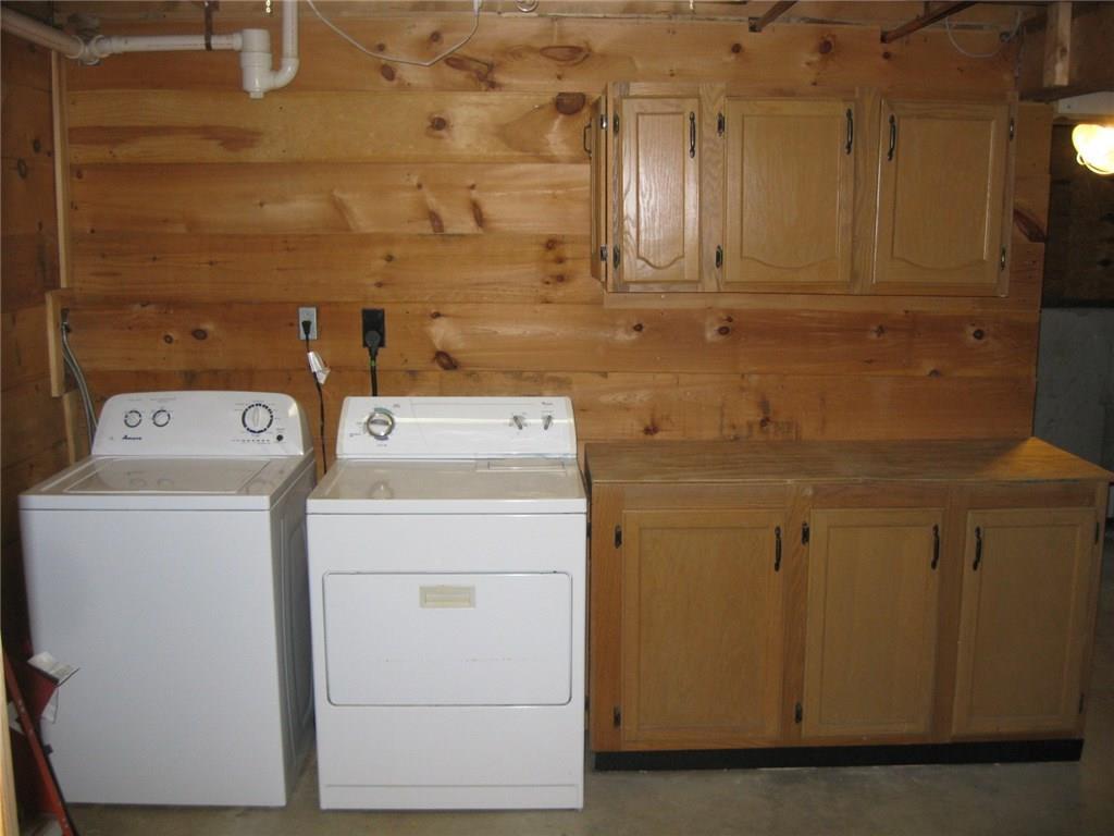 876 Ridge Road Windsor, ME 04363 - Photo 15 of 18 Laundry and workshop area in basement