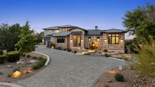 a front view of a house with patio