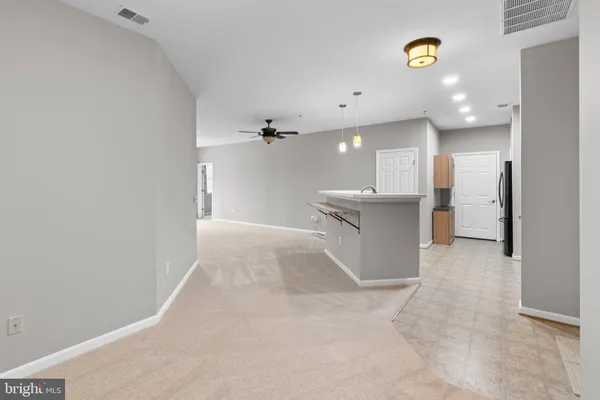 $325,000 | 2607 Chapel Lake Drive, Unit 107, Gambrills, MD 21054