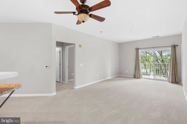 $325,000 | 2607 Chapel Lake Drive, Unit 107, Gambrills, MD 21054