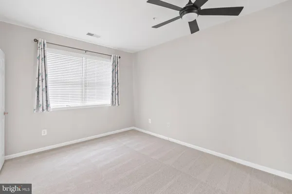 $325,000 | 2607 Chapel Lake Drive, Unit 107, Gambrills, MD 21054